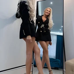 One woman and several men having sex outdoors late at night