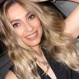 The girl in the sweater masturbates and squirts semen.